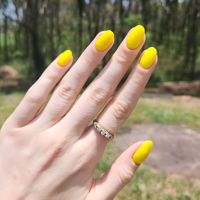Hand showing Lemon shade on nails