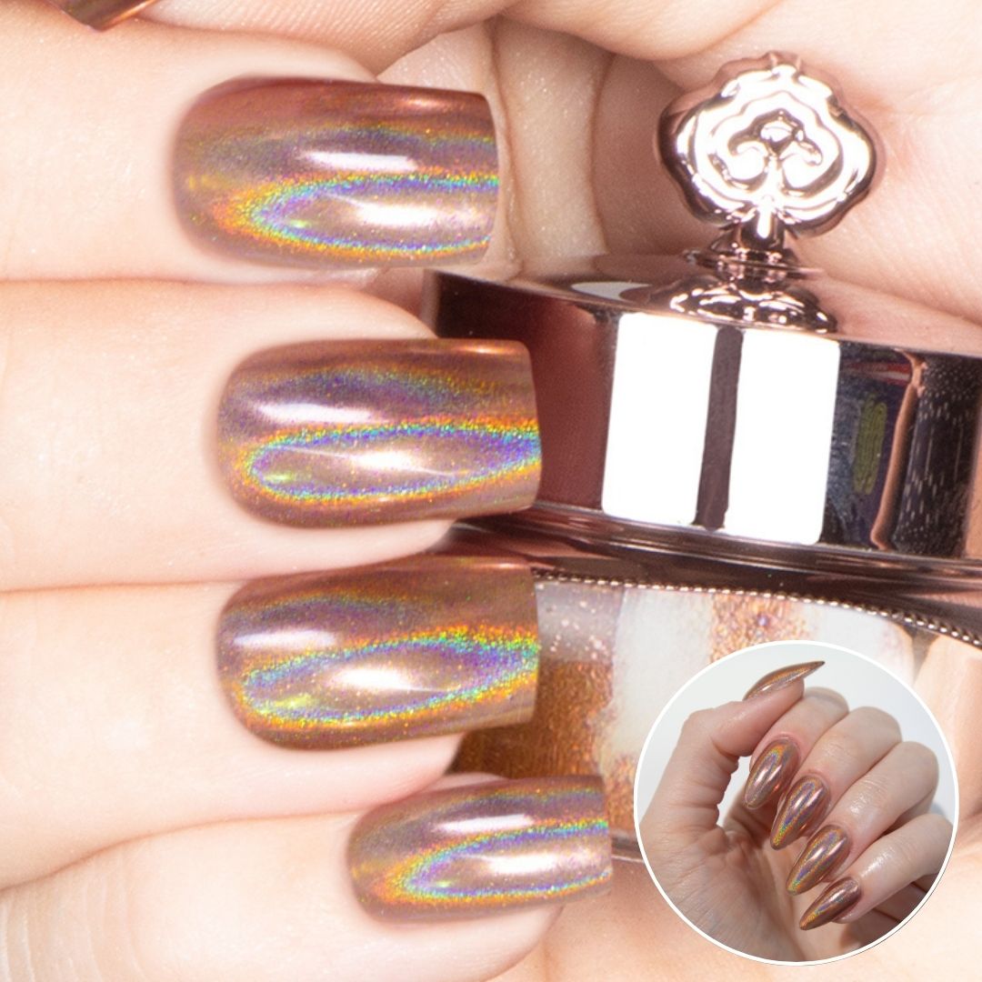 Nails featuring a champagne-gold holographic powder with warm burnt orange and brown undertones.
