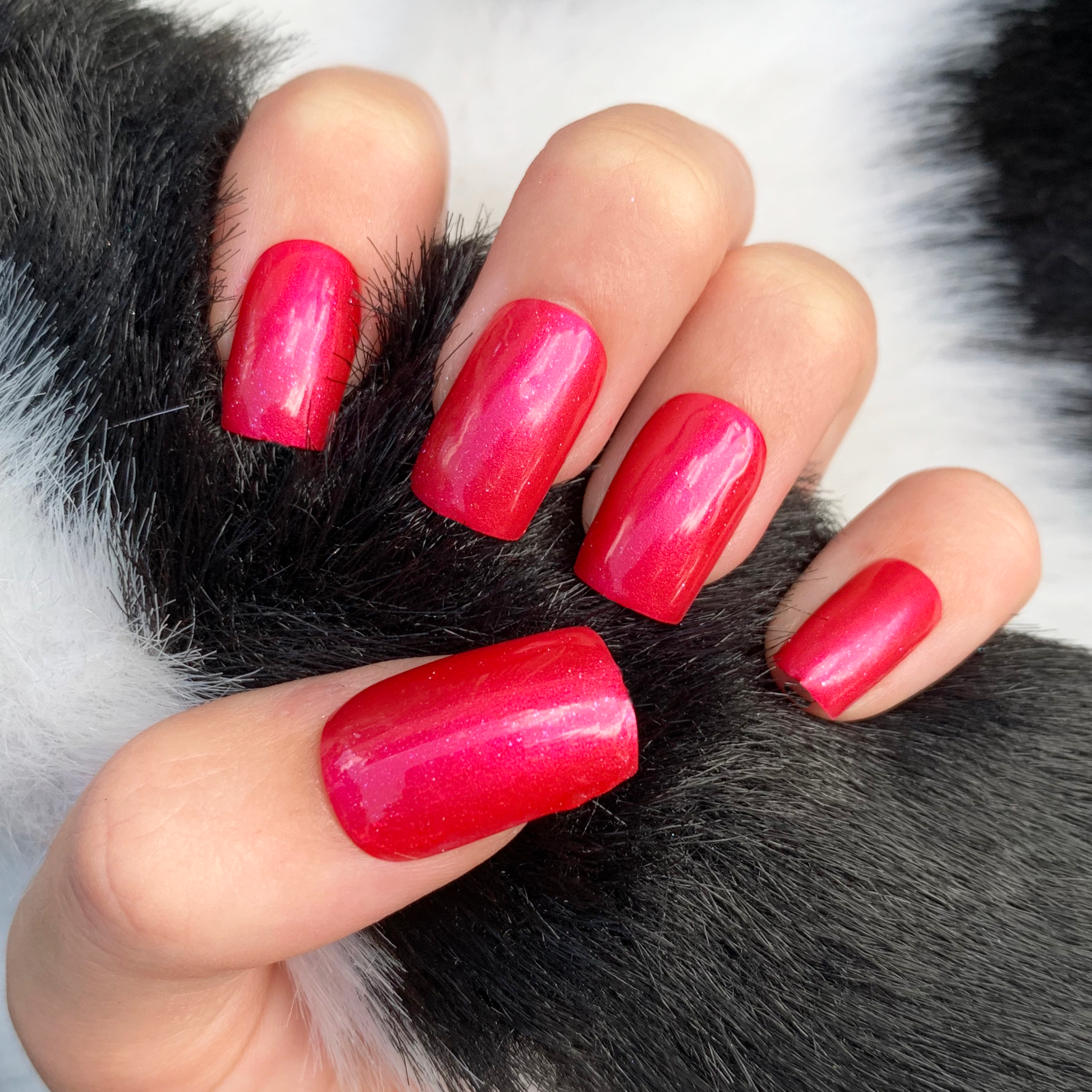 A bold and vibrant cherry red color